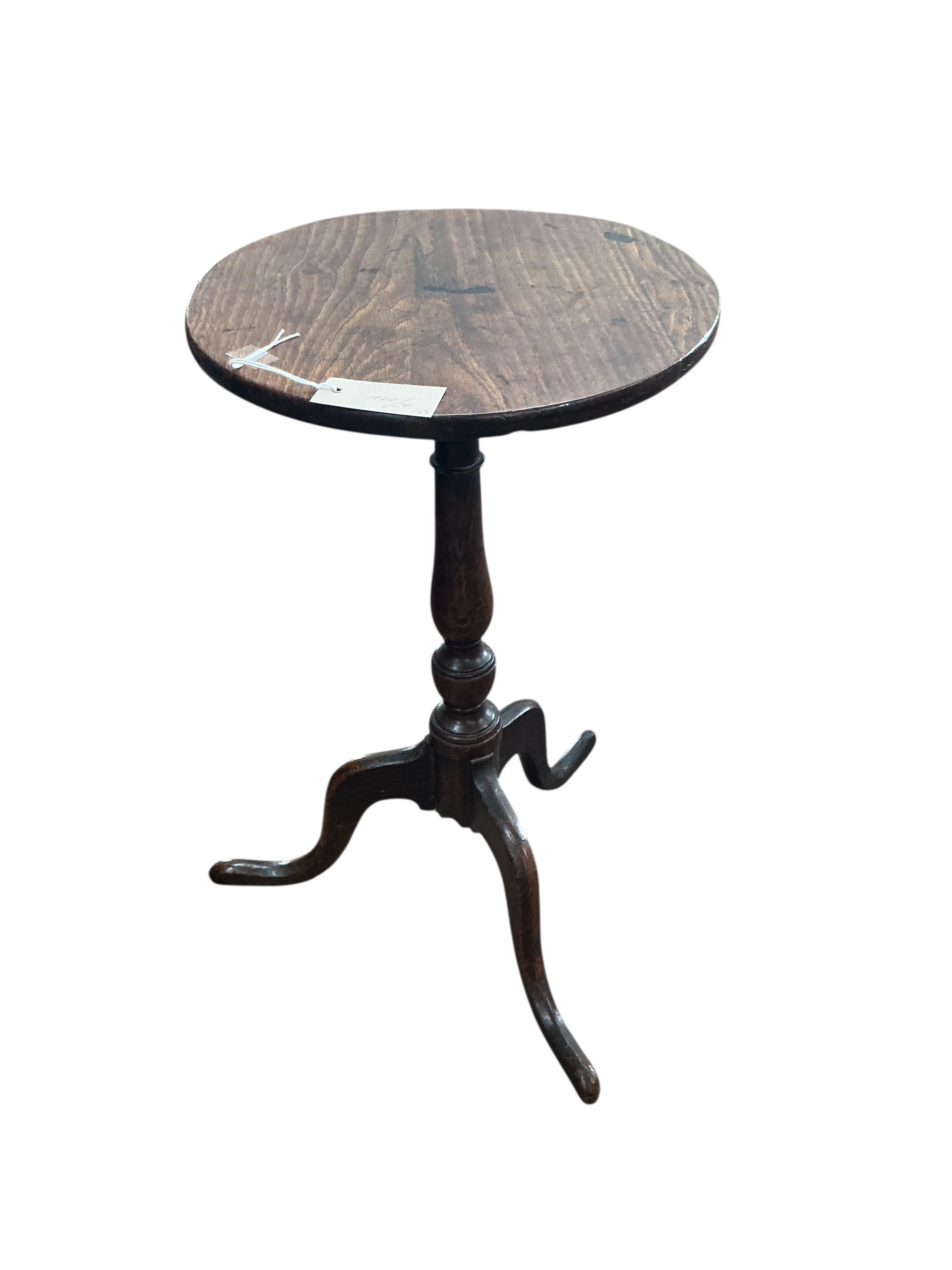 An early 19th century circular oak tripod wine table, diameter 36cm, height 64cm together with a carved step/stool, an inlaid table and one other